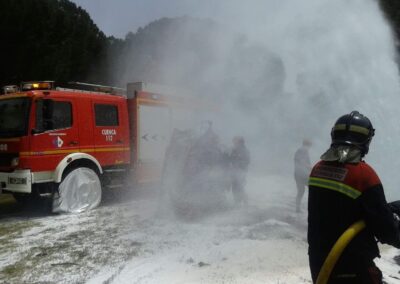 Firetruck and firemen with ISK fire survival kit